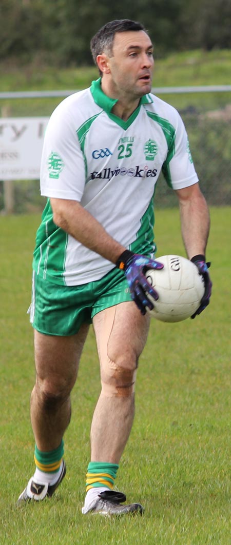 Action from the intermediate football championship match against Naomh Bríd.