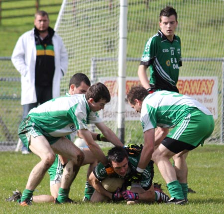 Action from the intermediate football championship match against Naomh Bríd.