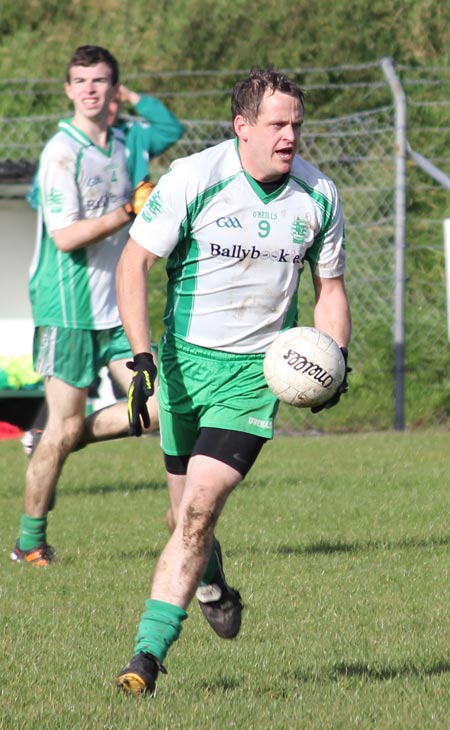 Action from the intermediate football championship match against Naomh Bríd.