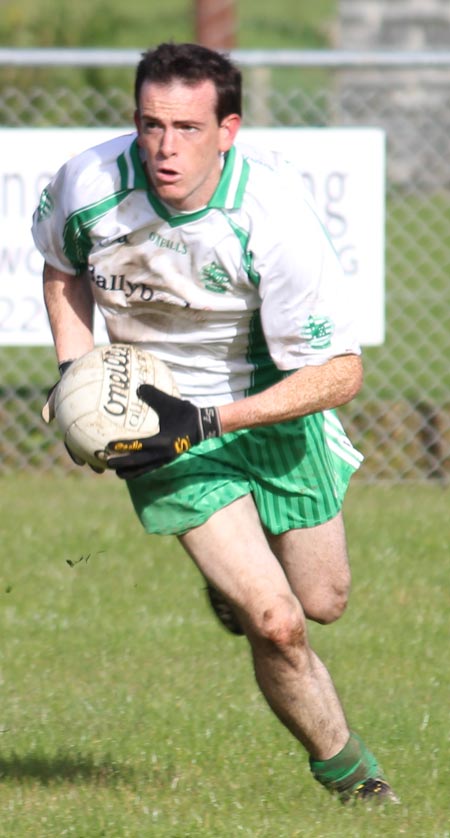 Action from the intermediate football championship match against Naomh Bríd.