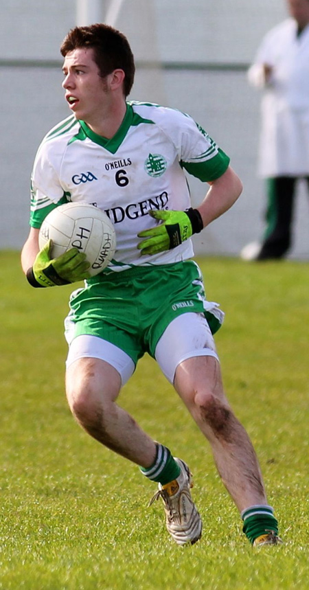 Action from the intermediate reserve football championship game against Naomh Bríd.