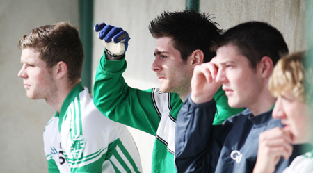 Action from the intermediate reserve football championship game against Naomh Bríd.