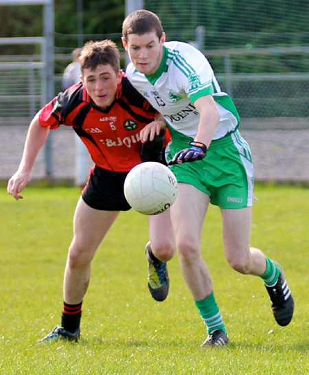 Action from the intermediate reserve football championship game against Naomh Bríd.