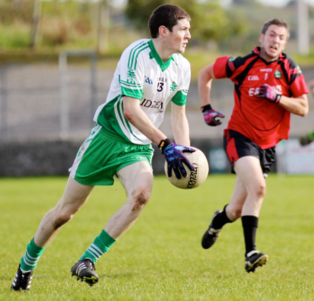 Action from the intermediate reserve football championship game against Naomh Bríd.