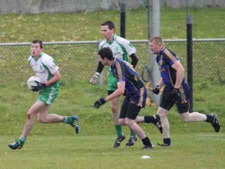 Action from the division three senior reserve football league match against Muff.