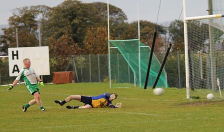 Action from the division three senior reserve football league match against Muff.