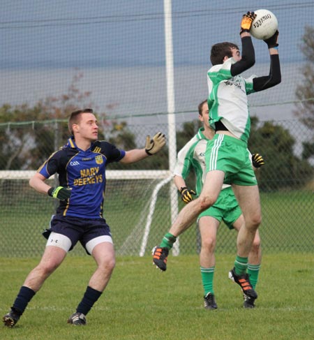 Action from the division three senior reserve football league match against Muff.