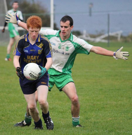 Action from the division three senior reserve football league match against Muff.