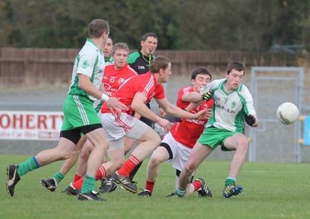 Action from the intermediate football championship semi-final against Naomh Colmcille.