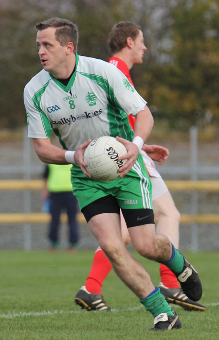 Action from the intermediate football championship semi-final against Naomh Colmcille.