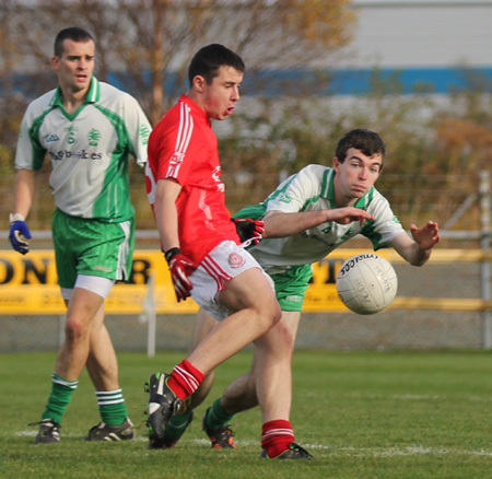 Action from the intermediate football championship semi-final against Naomh Colmcille.