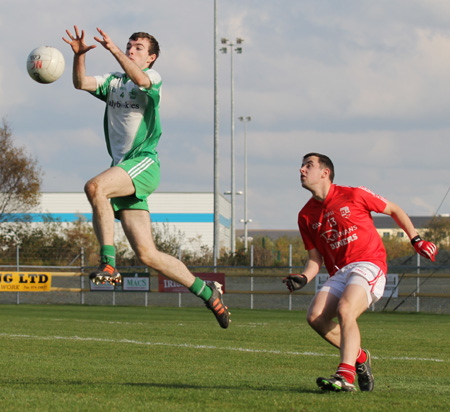 Action from the intermediate football championship semi-final against Naomh Colmcille.