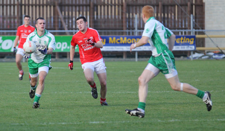 Action from the intermediate football championship semi-final against Naomh Colmcille.