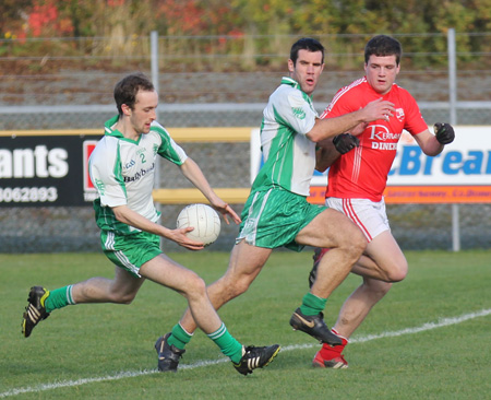 Action from the intermediate football championship semi-final against Naomh Colmcille.