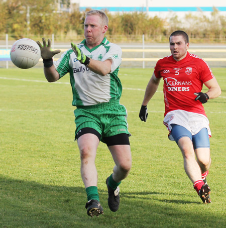 Action from the intermediate football championship semi-final against Naomh Colmcille.