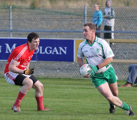 Action from the intermediate football championship semi-final against Naomh Colmcille.