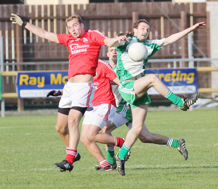 Action from the intermediate football championship semi-final against Naomh Colmcille.