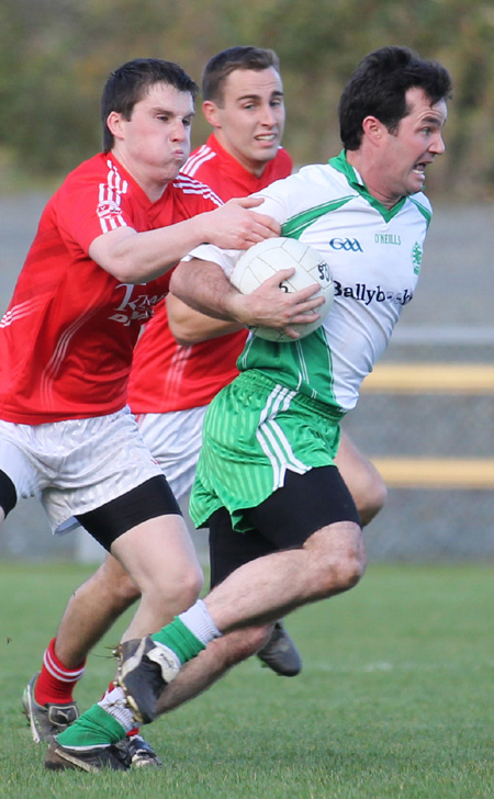 Action from the intermediate football championship semi-final against Naomh Colmcille.