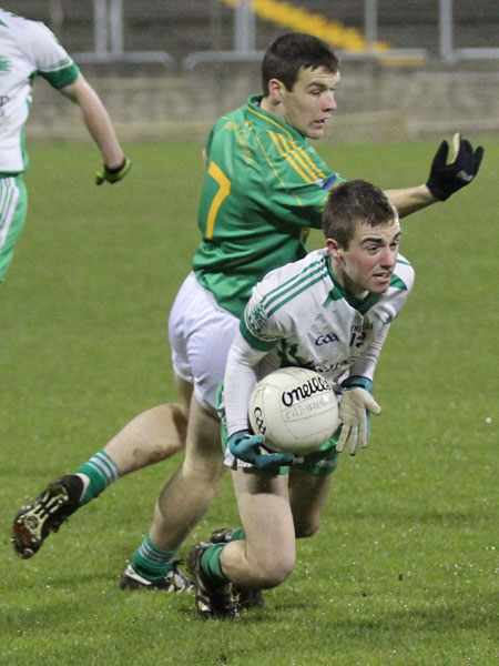 Action from the intermediate reserve football championship game against Naomh Columba.