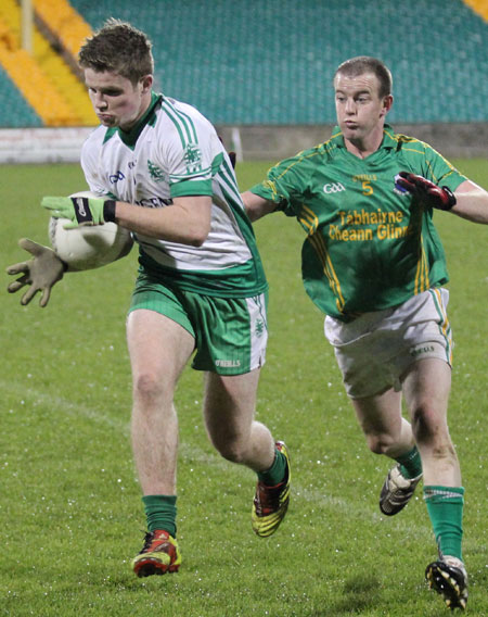 Action from the intermediate reserve football championship game against Naomh Columba.