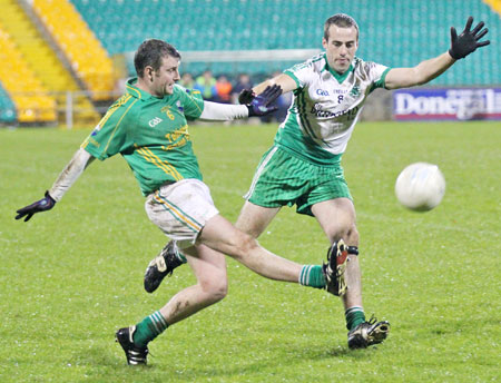 Action from the intermediate reserve football championship game against Naomh Columba.