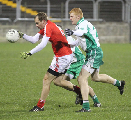 Action from the intermediate football championship semi-final against Naomh Colmcille.