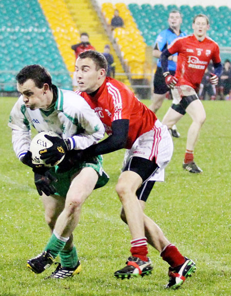 Action from the intermediate football championship semi-final against Naomh Colmcille.