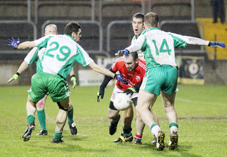 Action from the intermediate football championship semi-final against Naomh Colmcille.