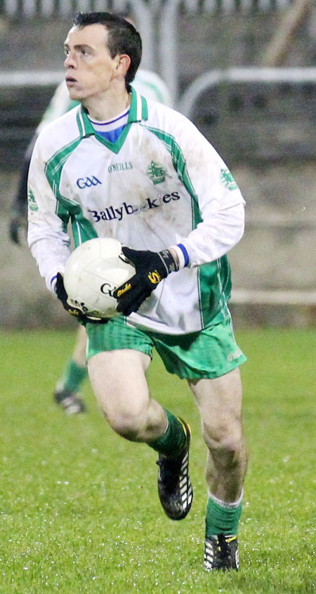 Action from the intermediate football championship semi-final against Naomh Colmcille.