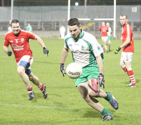 Action from the intermediate football championship semi-final against Naomh Colmcille.