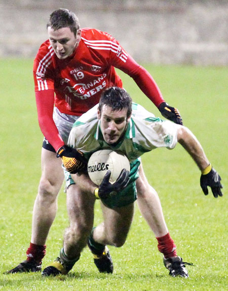 Action from the intermediate football championship semi-final against Naomh Colmcille.