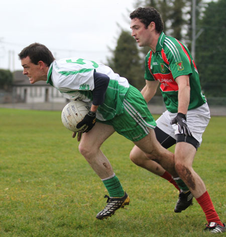 Action from the division three senior reserve football league match against Muff.