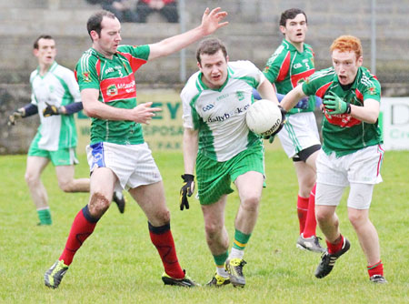 Action from the division three senior reserve football league match against Muff.