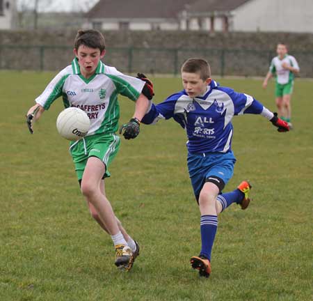 Action from the under 14 league game between Aodh Ruadh and Four Masters.