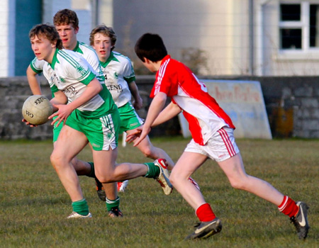 Action from the reserve division 3 senior game against Naomh Colmcille.