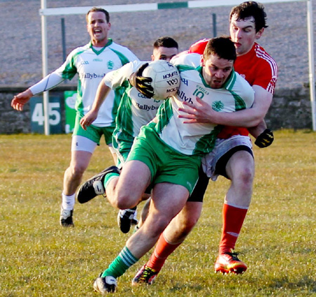 Action from the  division 3 senior game against Naomh Colmcille.