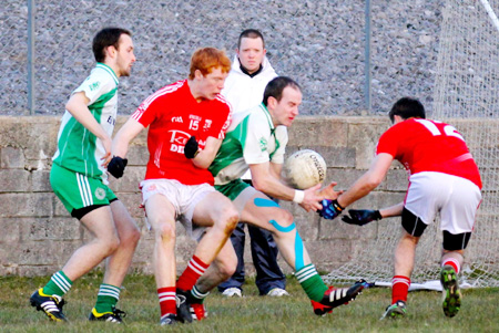 Action from the  division 3 senior game against Naomh Colmcille.