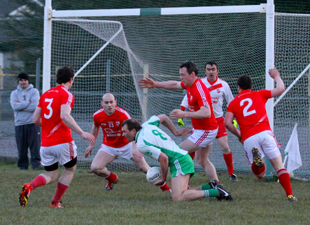 Action from the  division 3 senior game against Naomh Colmcille.