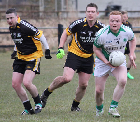 Action from the reserve division 3 senior game against Naomh Padraig, Lifford.