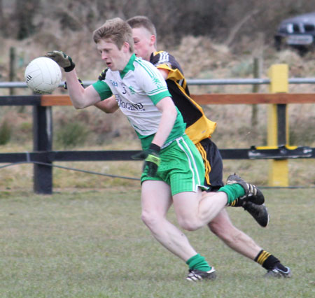 Action from the reserve division 3 senior game against Naomh Padraig, Lifford.