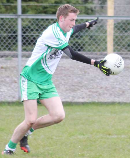 Action from the division three senior football league match against Naomh Columba.