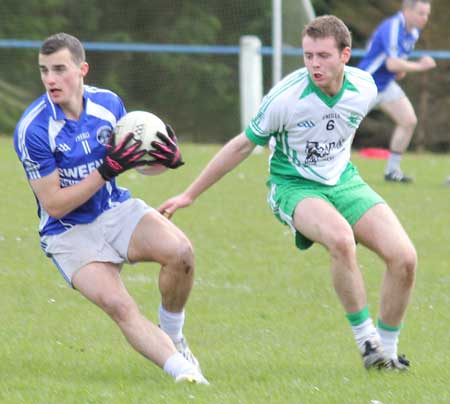 Action from the division three senior football league match against Fanad Gaels.