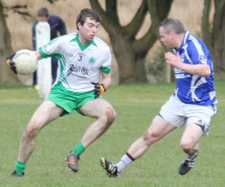 Action from the division three senior football league match against Fanad Gaels.