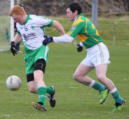 Action from the division three senior football league match against Downings.