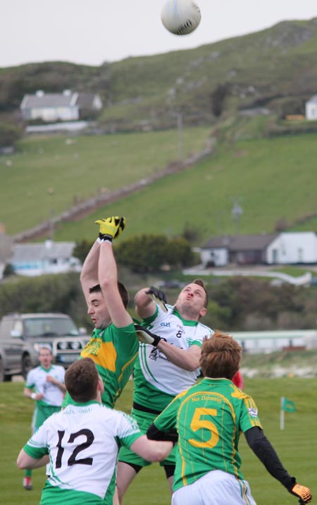 Action from the division three senior football league match against Downings.