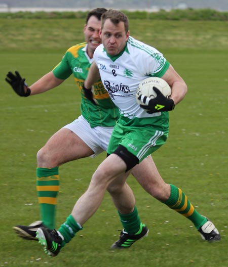 Action from the division three senior football league match against Downings.