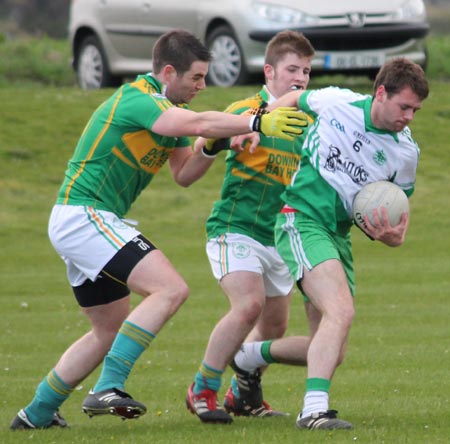 Action from the division three senior football league match against Downings.
