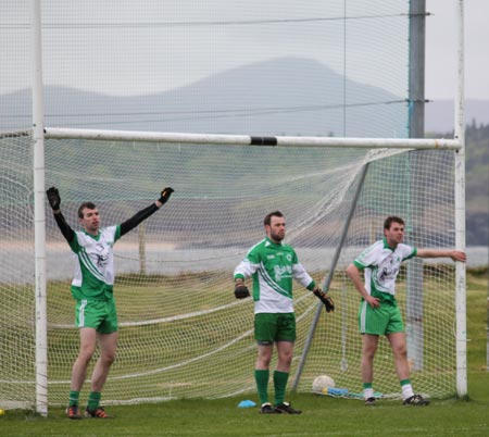 Action from the division three senior football league match against Downings.