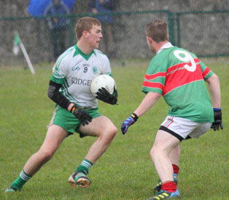 Action from the reserve division 3 senior game against Carndonagh.