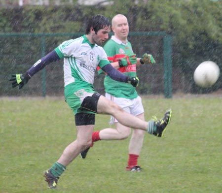 Action from the reserve division 3 senior game against Carndonagh.